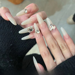 UNIKOO Milky White Cooling Long Oval Press on Nails