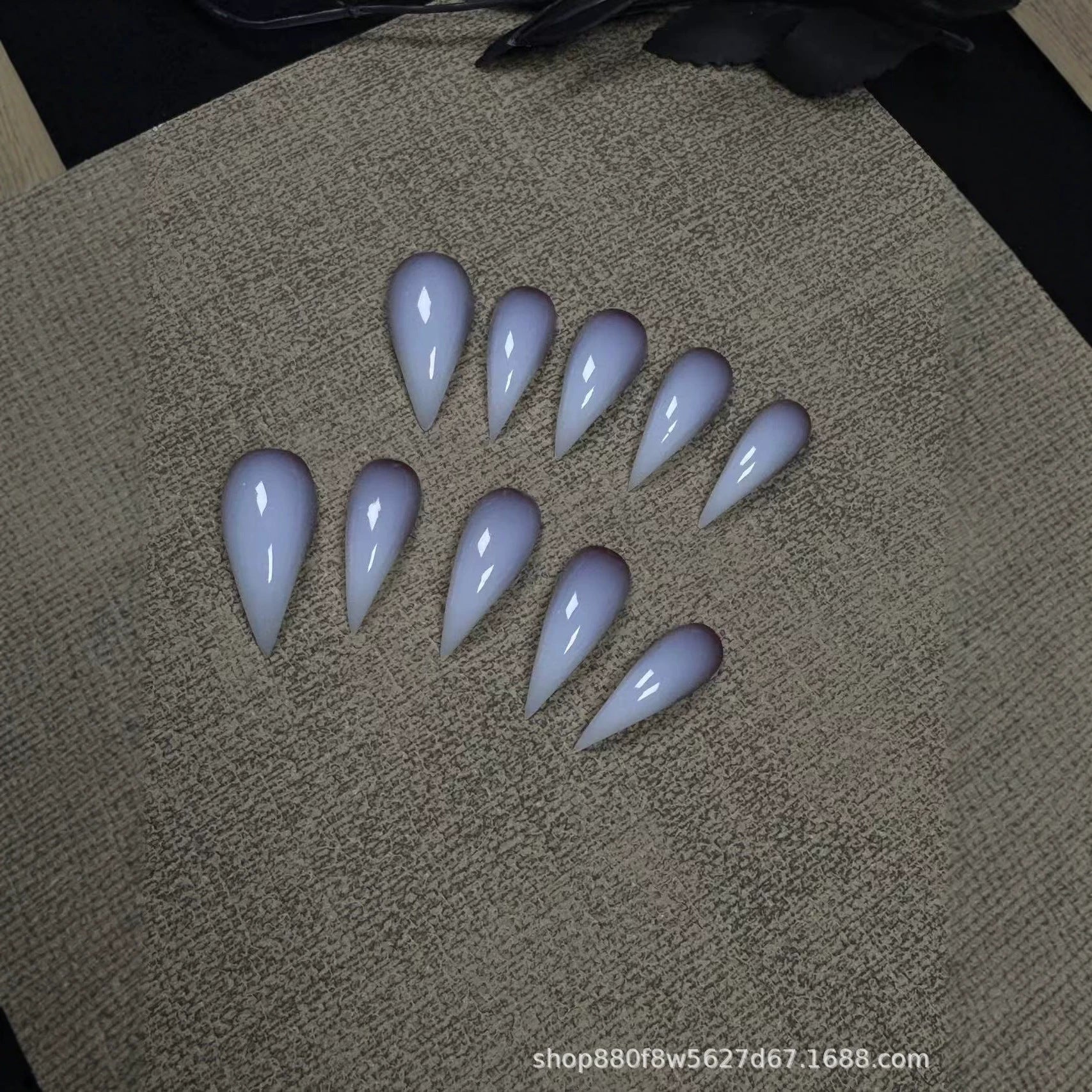 Pale white dragon claws