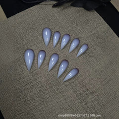 Pale white dragon claws