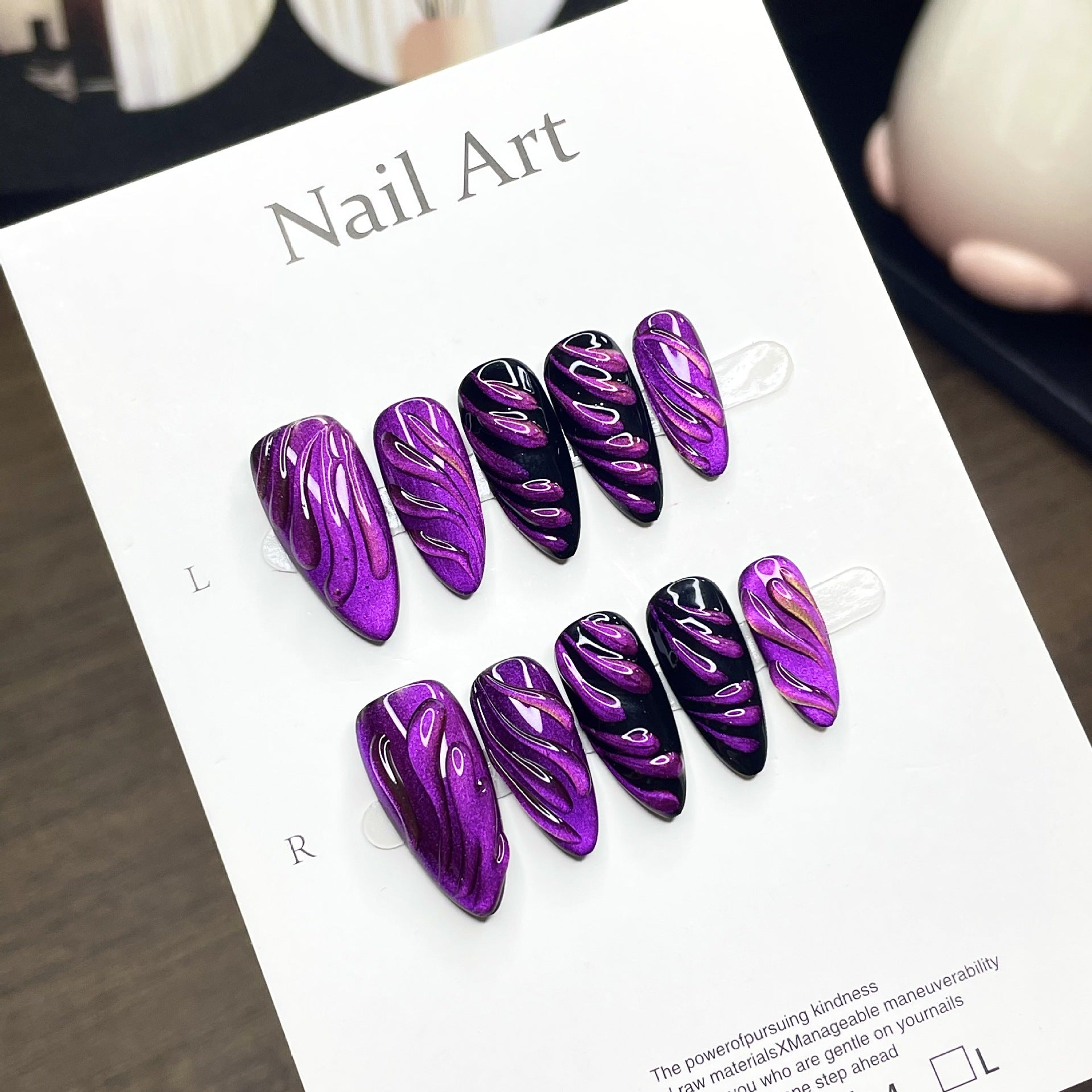 Purple drangen almond nail